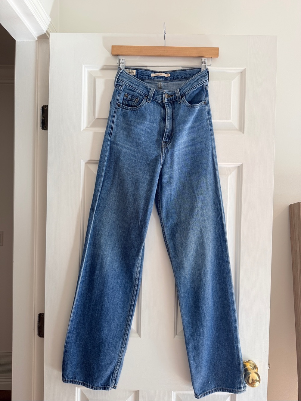 Levi’s “high loose” medium dark wash jeans